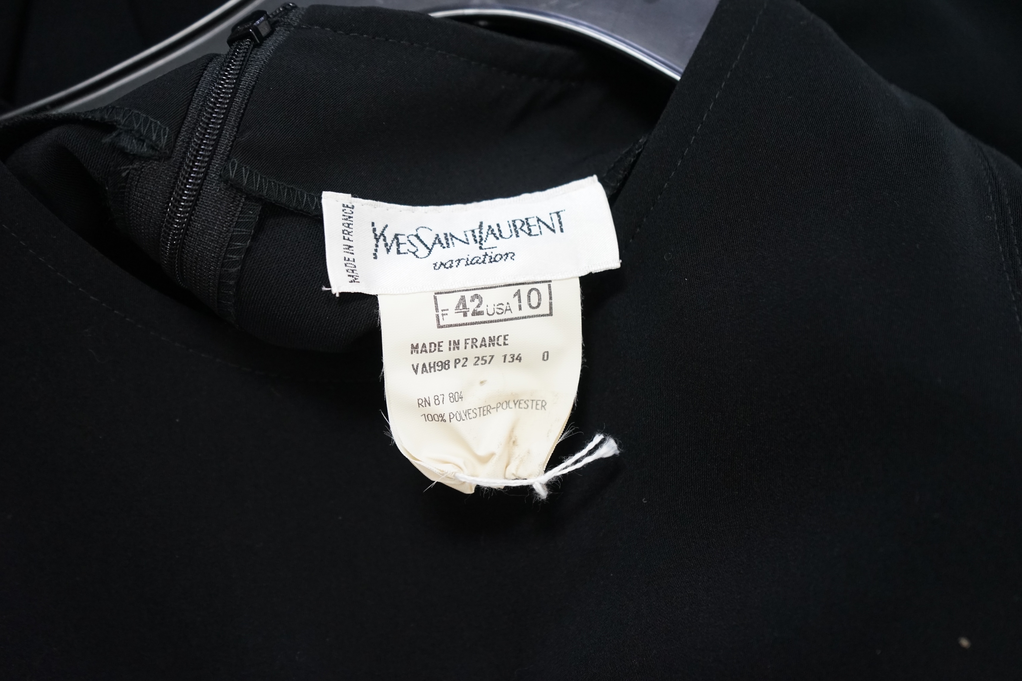 Two vintage Yves Saint Laurent variation lady's black evening dresses, F 42 (UK 14). Proceeds to Happy Paws Puppy Rescue